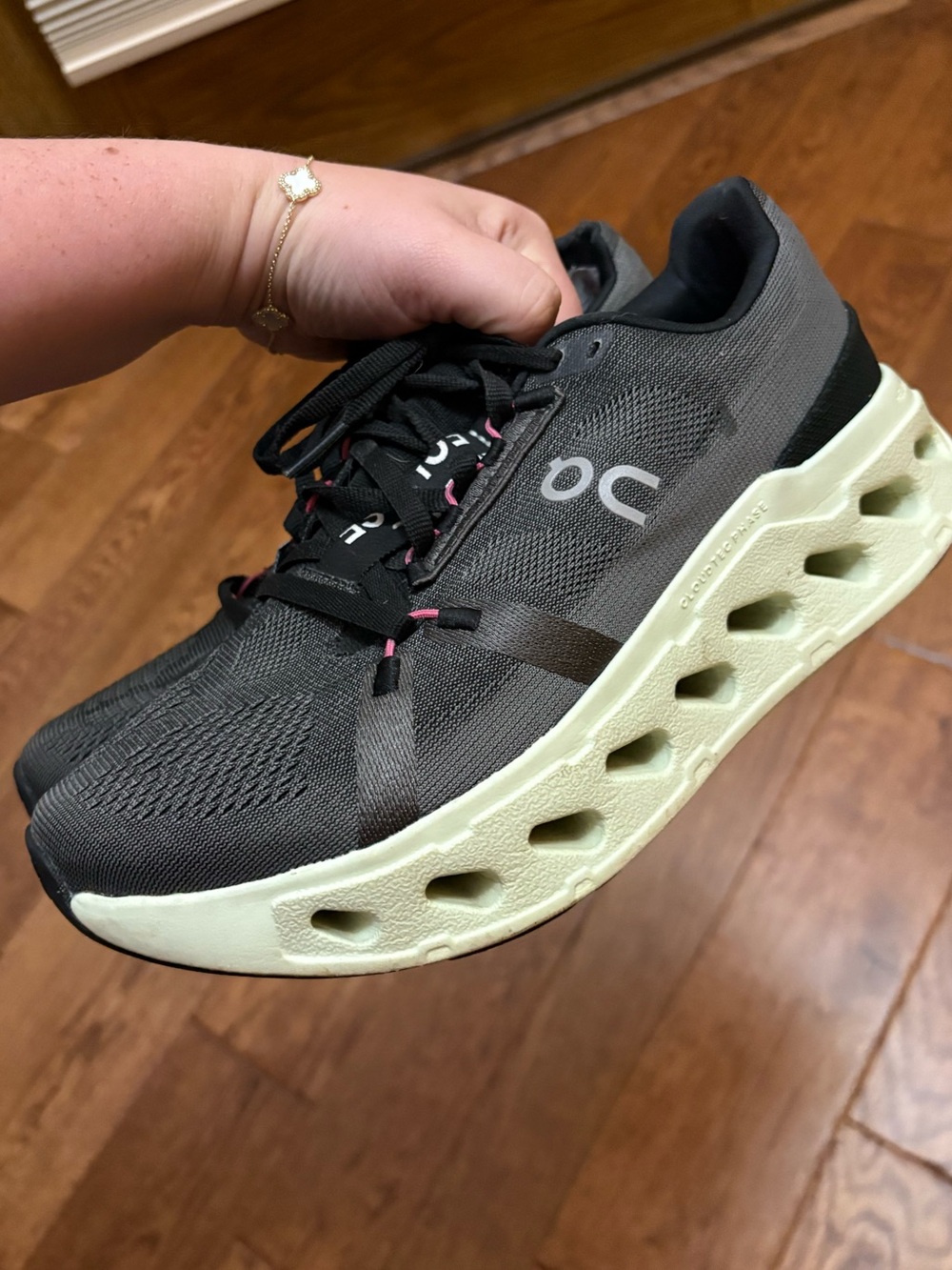On Running Women's Black Athletic Sneakers with Cream Midsole